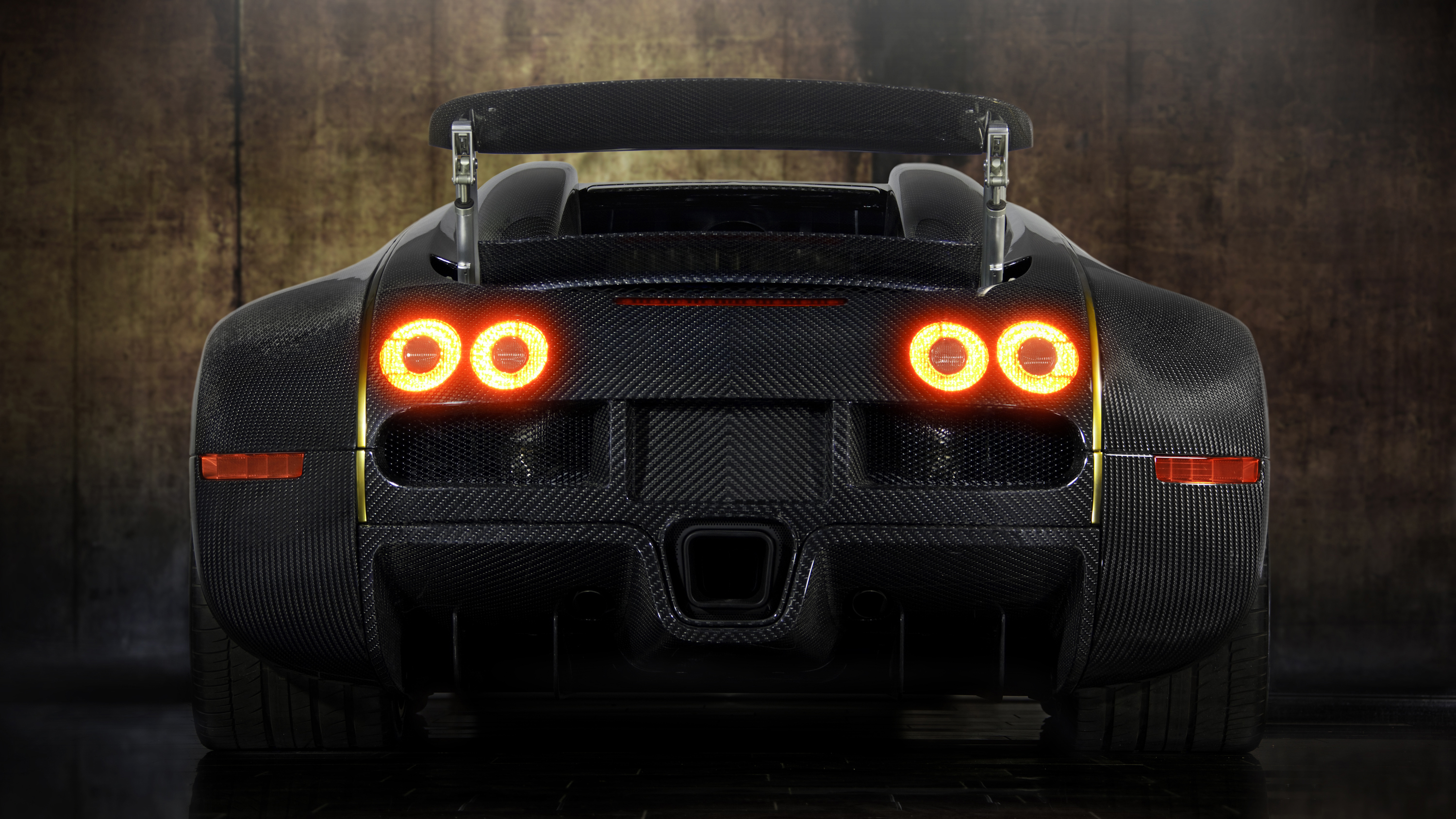 Басс в тачку. Bugatti Veyron Mansory. Bugatti Veyron фары. Bugatti Mansory. Mansory Bugatti Veyron linea Vincero d`Oro.